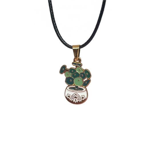 Enamel Peperomia houseplant pendants with gold-tone frame on black cord, hand-picked boutique jewelry from The Pink Plant Lady