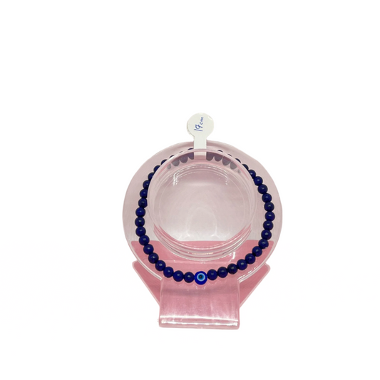 Handmade Lapis Lazuli & Aquamarine crystal bracelet with 6mm natural beads and a plastic evil eye accent bead, 16cm length on elastic cord.