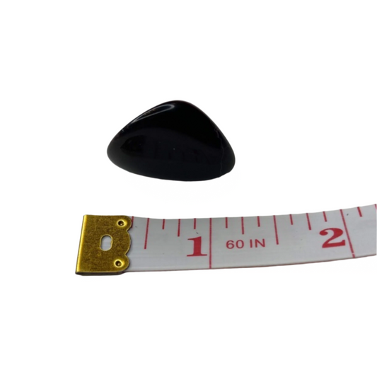 Obsidian tumble (Stone of Truth), provides protection, grounding, emotional release, and intuition enhancement; symbolizes smooth energy flow, ease, and gentle guidance.