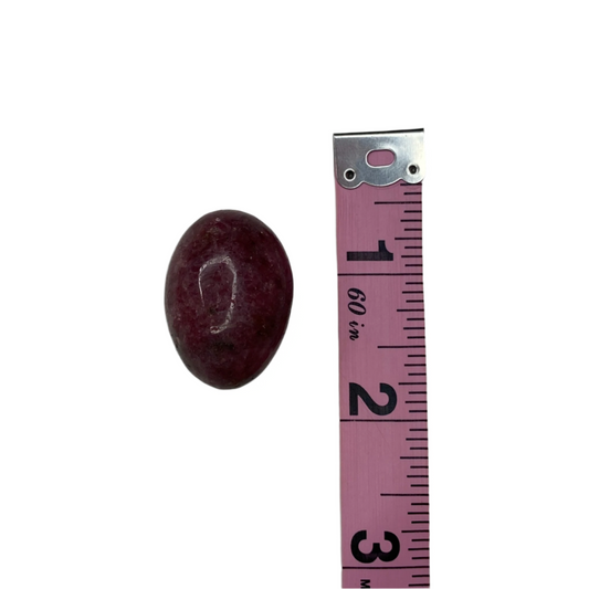 Strawberry quartz tumble, promotes calmness, emotional balance, mindfulness, and universal love; symbolizes smooth energy flow, ease, and gentle guidance.