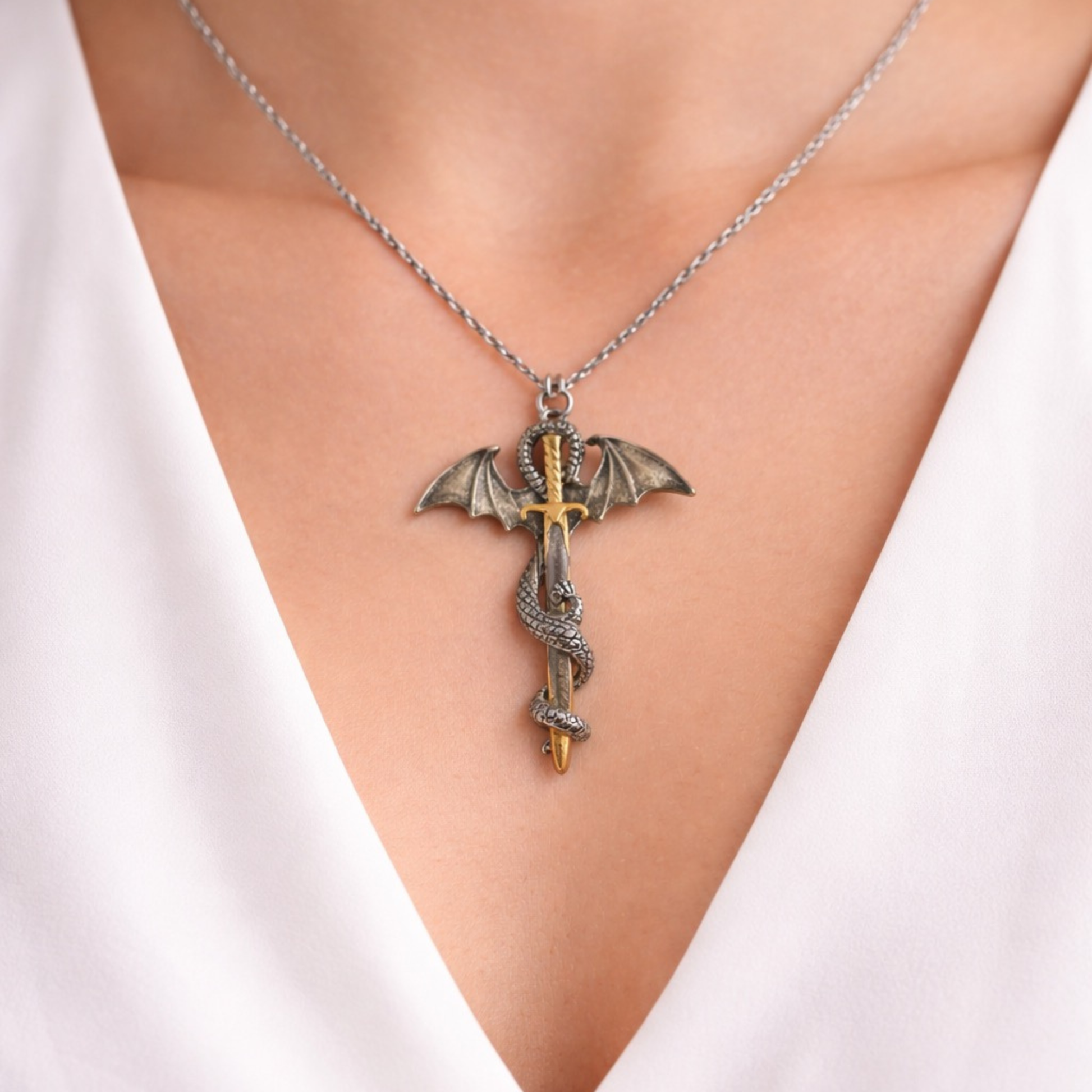 Glow in the dark dragon sword necklace with silver and gold tone fantasy pendant wrapped dragon design