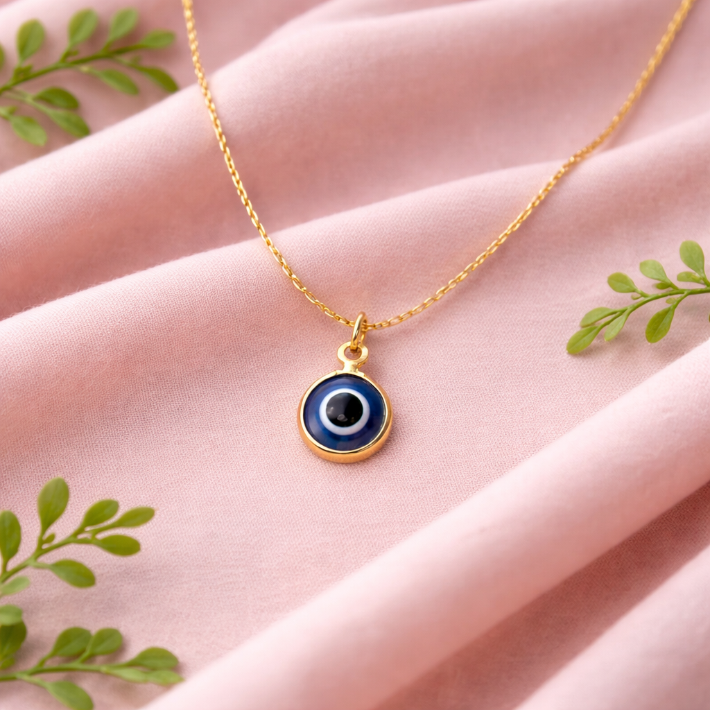 Gold tone blue evil eye necklace styled as protective symbolic jewelry gift idea