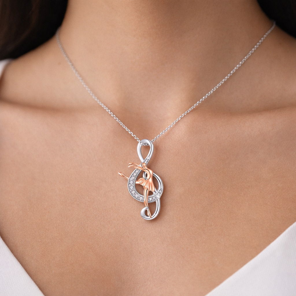 Silver and rose gold tone ballerina necklace with rhinestone details, elegant dance jewelry pendant